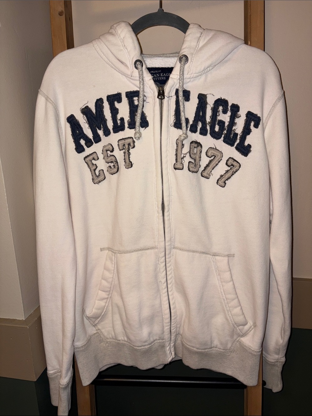 American Eagle Outfitters Cream Zip-Up Hoodie with Navy & Tan Appliqué